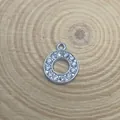 15mm silver-toned round circle pendant with sparkling rhinestones on wood background - Letter O Style (C15)