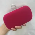 Close-up view of a hot pink velvet evening clutch bag featuring a rhinestone ring clasp - S / Rose Red