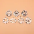 Collection of seven silver chakra pendants with geometric lotus patterns for DIY jewelry - Chakra Pendant Set (L10103) / 7-Pack Set / Antique Silver