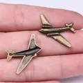 Colgante de avión de bronce vintage para joyería DIY, accesorio de tamaño 25x31mm - Forma de Avión (A13412) / Paquete de 10 / Bronce Antiguo
