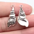 Antique silver seashell charm pendants for jewelry making, 29x13mm sea snail design. - Antique Silver
