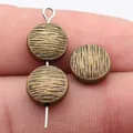 Vintage bronze round beads with scratched wood grain texture for DIY jewelry. - 扁圆形木纹珠(A14494) / Antique Bronze