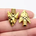 Vintage antique gold arrowhead pendants for DIY jewelry making shown on fingertips for scale - Arrowhead Style (D15299_W33-A27) / 31x20x7.5mm / Antique Gold