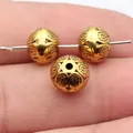 Antique golden relief spacer beads for DIY jewelry making with intricate patterns 9.3mm - 10 Pieces Pack / Antique Gold