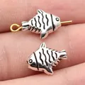 Perline a forma di pesce in argento antico per gioielli, design vintage 14x12x5.3mm. - Perlina Pesce a Doppia Faccia / Argento antico