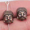 Detailed 11x9mm antique copper Buddha head spacer bead for DIY jewelry making projects - Buddha Head Bead (D11194) / Antique Red Copper
