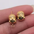 Detailed golden Buddha head charms made of zinc alloy for jewelry making, 11x9mm. - Gold
