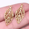 Golden 28x12mm hollow leaf pendant charm for DIY handmade jewelry crafting projects - Antique Gold