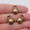 Three antique bronze kettlebell pendants for DIY jewelry making. - Antique Bronze (A14206)