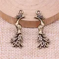 Antique bronze phoenix peacock bird pendant charm for vintage jewelry DIY making. - Antique Bronze