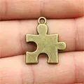 Ciondolo a forma di puzzle in lega di zinco bronzo antico per bigiotteria - Bronzo Antico (A11744)