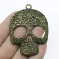 Gran colgante de calavera grabado con flores en bronce antiguo para la creación de joyas DIY - Bronce Antiguo