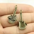 Vintage bronze alloy guitar pendant with wings musical charm for DIY jewelry making - Antique Bronze (A12044)