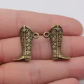 Pair of antique bronze 3D cowboy boot charms with star patterns for DIY jewelry making - 3D High Boot Star Engraved Charm (A14045) / Antique Bronze