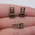 Miniature 3D chair charms in antique bronze finish for dollhouse decor, 17x7x6mm. - Mini Chair Style (A14030) / Antique Bronze