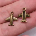 Colgantes de avión en bronce vintage de 15x13mm para la creación de hermosas joyas DIY - Airplane Shape (A13102) / Bronce Antiguo