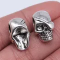 Paar antiek zilveren schedel kralen met grote gaten en piraten ooglapje voor DIY sieraden - Doodshoofd (B11466) / 19x12mm / Antiek Zilver