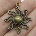 Ciondolo sole in bronzo antico per creazione gioielli, in lega di zinco 35x31mm. - Forma di Sole (A12106) / Bronzo Antico