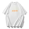 Oversized wit heren T-shirt met verlaagde schouders en oranje California print - 2XL / Tops / Broken Wit