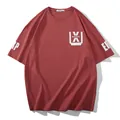 Oversized drop shoulder T-shirt in brick red with white graphic print on chest - 2XL / Tops / Wine Red