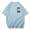 Oversized light blue short sleeve t-shirt with stylish black graphic chest print - 2XL / Tops / Sky Blue