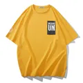Men's oversized yellow cotton short sleeve T-shirt with Nevar Un graphic chest print - Yellow