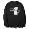 Minimalist black long-sleeve T-shirt with LEADER graphic print on chest. - XL / Tops / Black