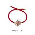Handmade adjustable red string bracelet featuring a pink pearl flower ball charm, 7.1g - Purple Flower Ball Red String Bracelet