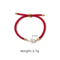 Red braided rope bracelet with pearl charm and golden accents, 3.7g weight - Double-Sided Smooth Red String Bracelet