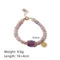 Elegant purple freshwater pearl bracelet featuring an amethyst bead and gold Fu charm - Bracelet / Purple