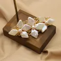 Elegant vintage hair clip featuring natural baroque pearls on a gold filigree metal base - Rhombus Flower Hair Clip