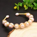 Eleganter handgefertigter golddrahtumwickelter Armreif mit rosa Naturperlen Schmuck - Rosa Lila Perlenreihen Armband