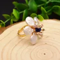 Baroque natural pearl flower ring with lapis lazuli stone on wood background - Dark Blue Gemstone Pearl Flower (GR0319) / Adjustable Open