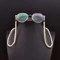 Elegant natural pearl eyeglass chain with gold link details on black display - Double Layered Glasses Chain