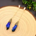 Vintage 925 silver needle blue irregular crystal drop earrings on a wood background - Blue