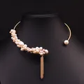 Elegant vintage freshwater pearl choker necklace with gold tassel on black mannequin stand - Multi-Pearl Tassel Style