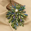 Elegant flower brooch with green iridescent crystals and a central freshwater pearl - Blue Green Plated Dual Use Style (GO0332C)