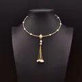 Elegante gouden choker met natuurlijke zoetwaterparels en een delicate kwastjeshanger - Afneembare Kwastje Choker / Goud
