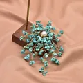 Handmade turquoise chip flower brooch with central natural freshwater pearl - Turquoise Branch Leaf Style (GO0332C)