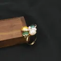 Elegant natural pearl flower ring with zircon accents on adjustable gold band. - Crystal Flower (GR0319) / Adjustable Open