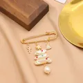 Elegant gold Christmas safety pin brooch featuring natural freshwater pearl tree charms - White Baroque Pearl Christmas Tree Style (GO0332C)