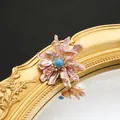 Elegant natural pink baroque pearl flower brooch with blue center stone on gold mirror - Purple Pearl Blue Stone Style (GO0332C)