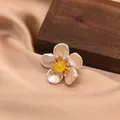 Elegant flower-shaped brooch with white pearl petals and yellow center bead for women - Yellow Flower Style (GO0332C)