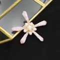 Handmade baroque star brooch featuring pink crystals and natural freshwater pearls. - Pink Pentagonal Crystal Brooch