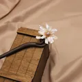 Exquisite handmade sandalwood hair stick featuring a white shell flower and natural pink pearl - Baroque Flower Sandalwood