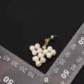Orecchino a grappolo di perle naturali finitura oro con scala graduata. - Stile 3 (Orecchini a Cuore Intrecciato)