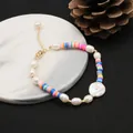 Elegant handmade natural pearl bracelet featuring colorful clay beads and gold clasp - Baroque Multicolor Bracelet / Multicolor Clay Style / Multicolor