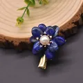 Vintage gold hair clip with a natural pearl center and blue lapis lazuli flower petals - Lapis Lazuli Pearl Hair Clip
