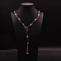 Collana lunga vintage fatta a mano con perle d'acqua dolce e nappe dorate. - Catena Maglione con Perle Barocche