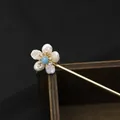 Handmade vintage style gold hair stick with baroque pearls and blue gemstone floral detail - Aquamarine Blue Flower Hair Stick